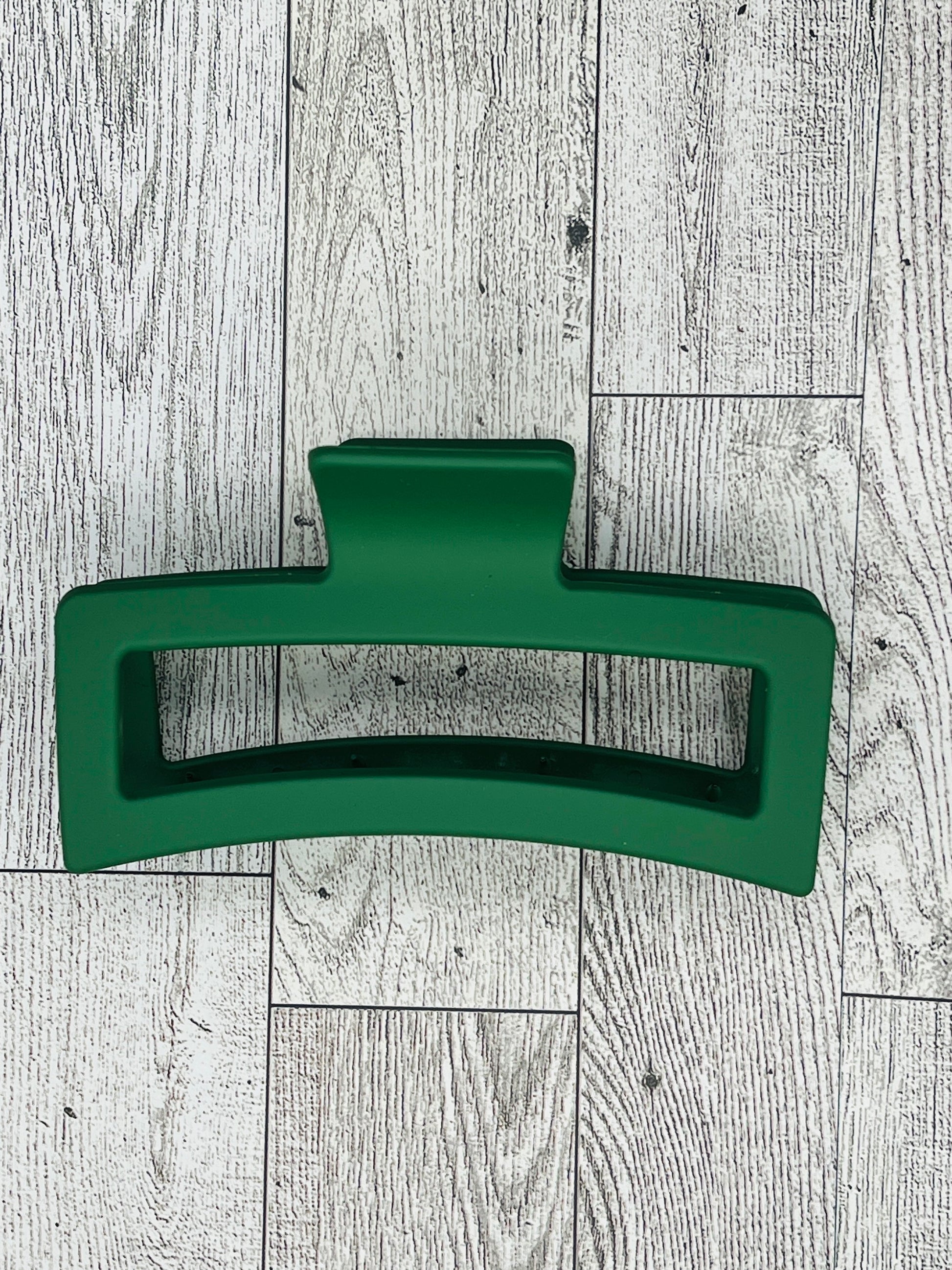 Matte Dark Green Hair Claw Clip - Rectangular shape - 4. 5 inches in length. Great for Braids, twists, long hair, thick hair, and coarse hair.