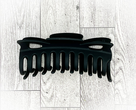 Black Large Bow Hair Claw Clip - Classic Bow shape - 4.9 inches in length. Great for Braids, twists, long hair, thick hair, and coarse hair.
