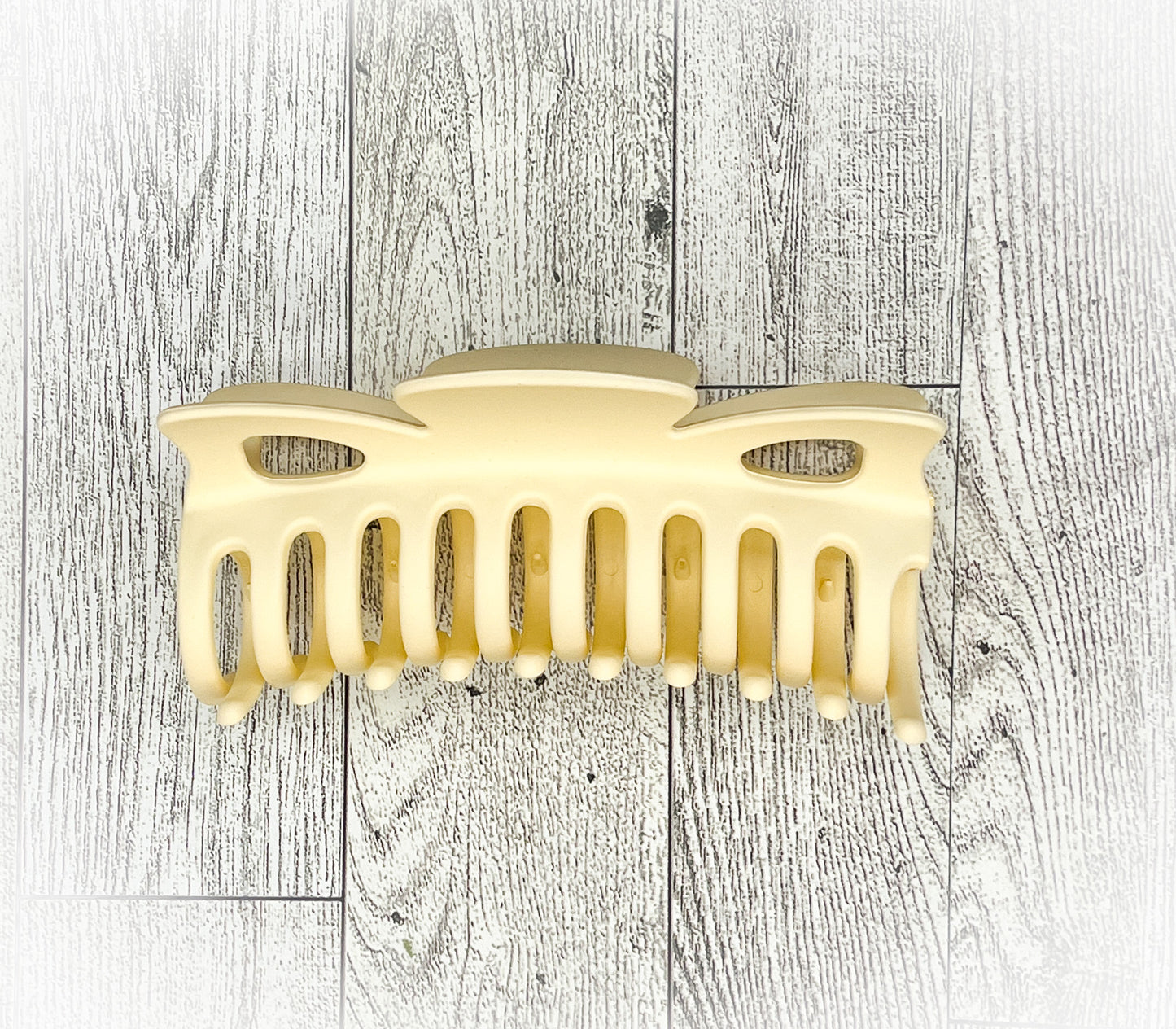 Matte Cream Hair Claw - Classic Bow shape - 4.5 inches in length. Great for Braids, twists, long hair, thick hair, and coarse hair.