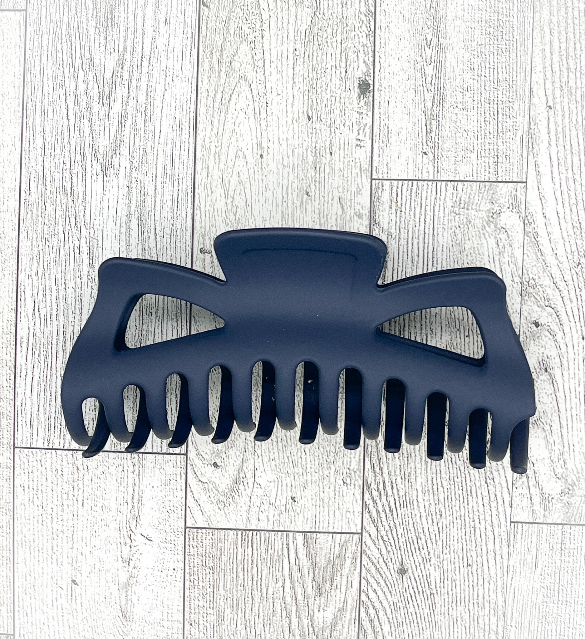 Matte Navy Blue Hair Claw - Classic Bow shape - 5 inches in length. Great for Braids, twists, long hair, thick hair, and coarse hair.