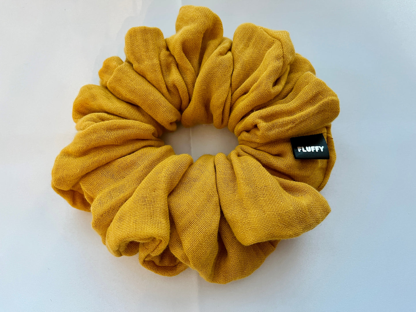 You are seeing our cotton scrunchies in 3 sizes. The sizes of our cotton scrunchies are Large, Medium and Mini. Simply select the size you want in the drop down menu and add them to the card. Our cotton scrunchies are perfect for all hair types and every person. We have multiple colors and sizes available