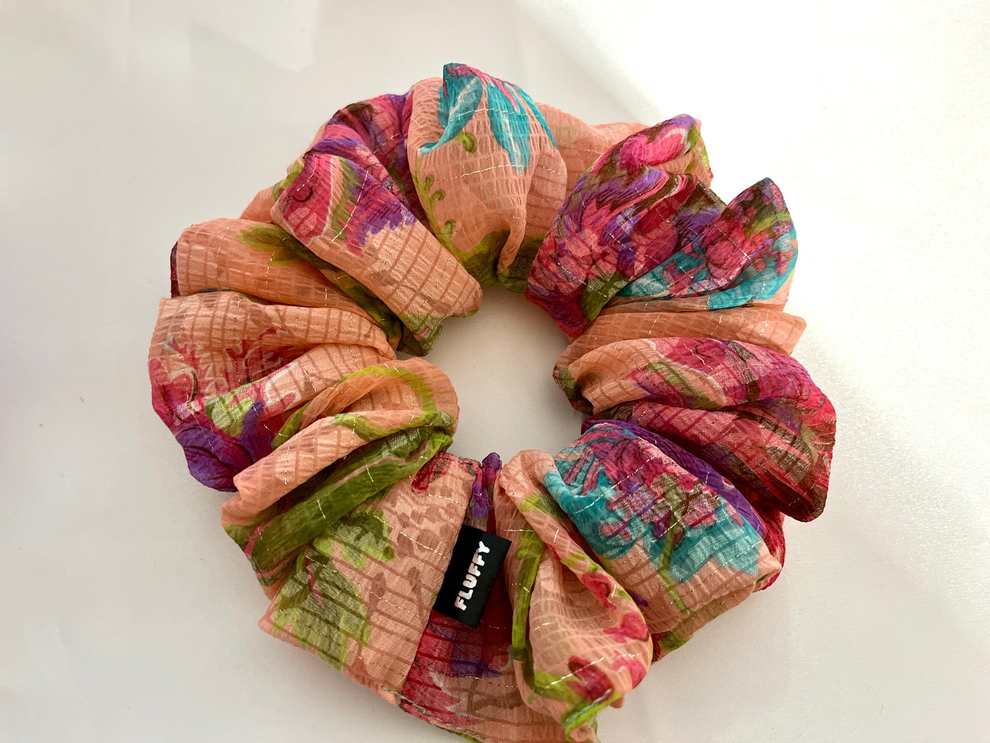 You are seeing our cotton scrunchies in 3 sizes.  The sizes of our cotton scrunchies  are Large, Medium and Mini.  Simply select the size you want in the drop down menu and add them to the card.   Our cotton scrunchies are perfect for all hair types and every person. We have multiple colors and sizes available
