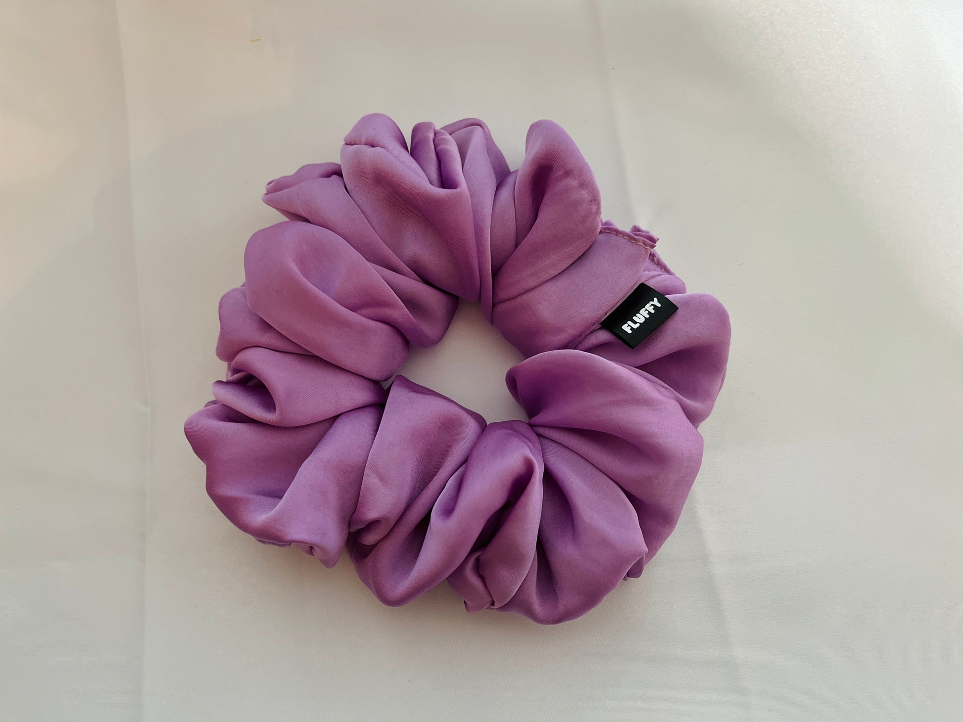 You are seeing our satin scrunchies in 3 sizes..  The sizes of our Satin Scrunchies are Large, Medium and Mini.  Simply select the size you want in the drop down menu and add them to the card.   Our Satin Scrunchies are perfect for all hair types and every person. We have multiple colors and sizes available