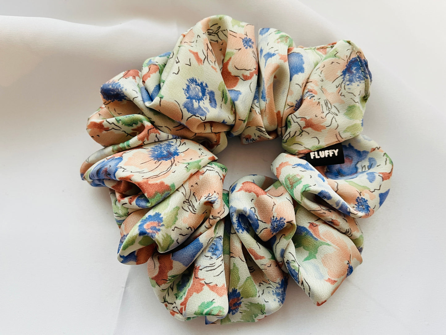 You are seeing our satin scrunchies in 3 sizes.. The sizes of our Satin Scrunchies are Large, Medium and Mini. Simply select the size you want in the drop down menu and add them to the card. Our Satin Scrunchies are perfect for all hair types and every person. We have multiple colors and sizes available