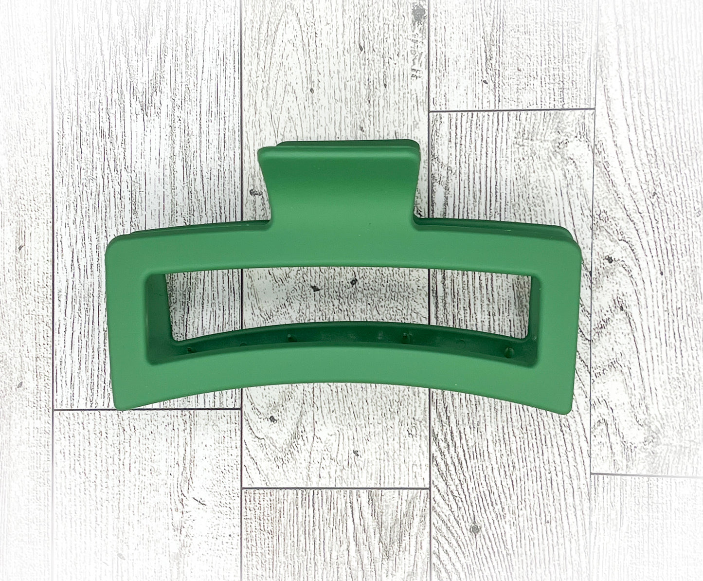 Matte Dark Green Hair Claw Clip - Rectangular shape - 4. 5 inches in length. Great for Braids, twists, long hair, thick hair, and coarse hair.