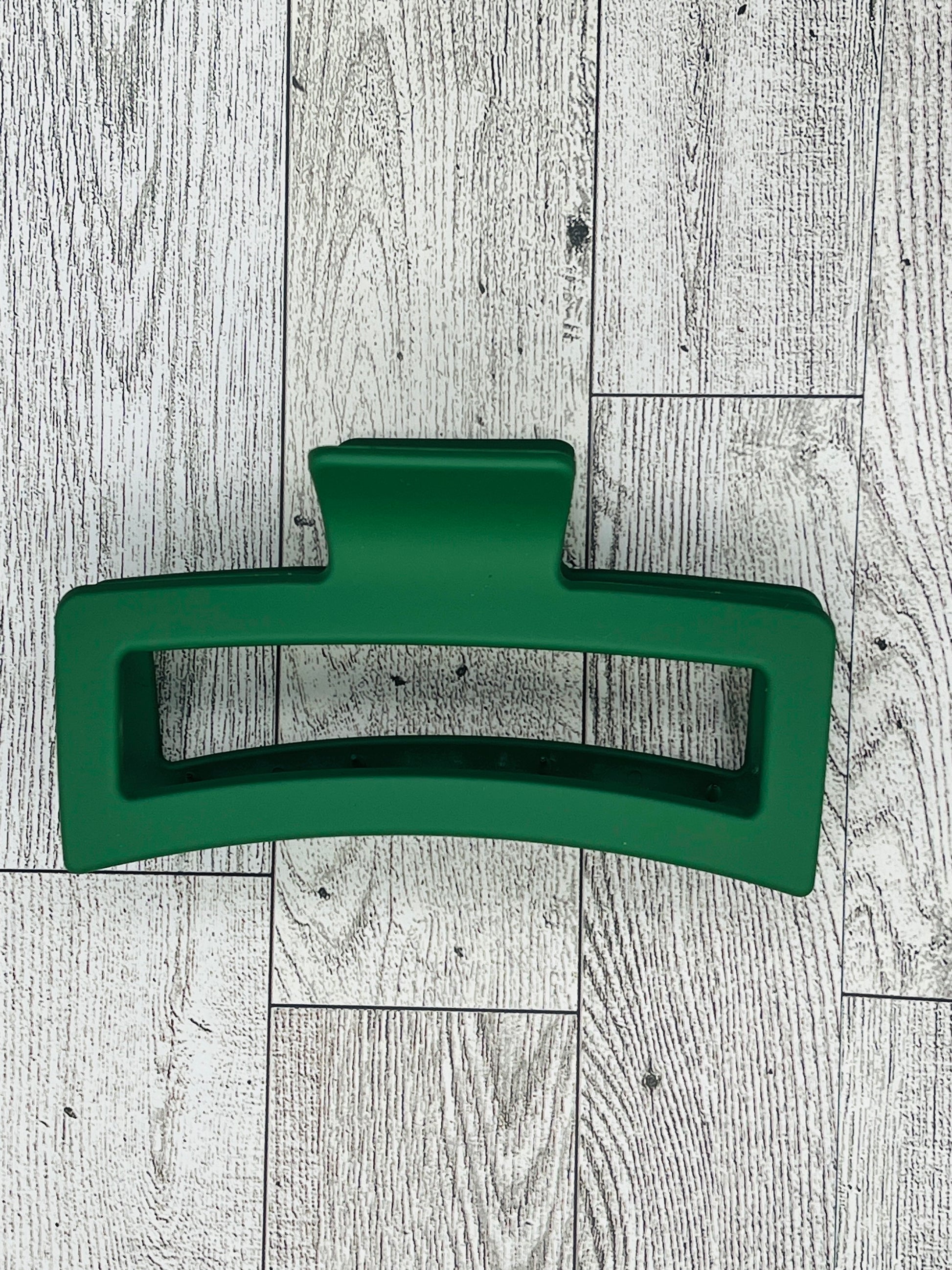 Matte Dark Green Hair Claw Clip - Rectangular shape - 4. 5 inches in length. Great for Braids, twists, long hair, thick hair, and coarse hair.