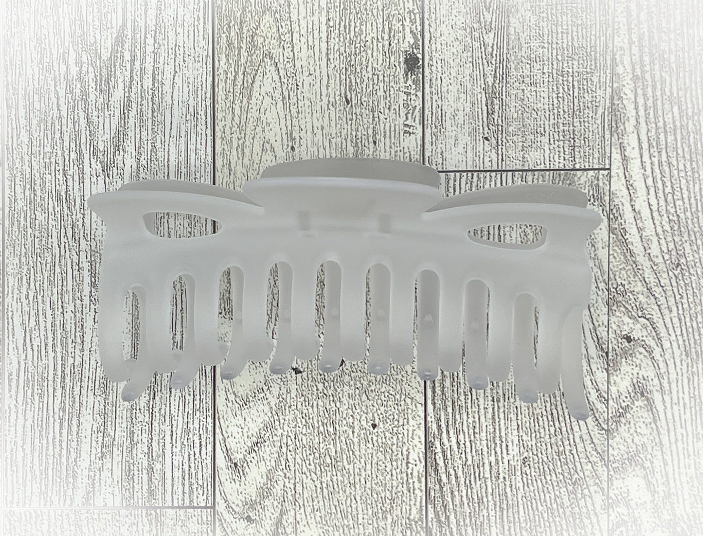 Frosted Clear Hair Claw - Classic Bow shape - 4.5 inches in length. Great for Braids, twists, long hair, thick hair, and coarse hair.