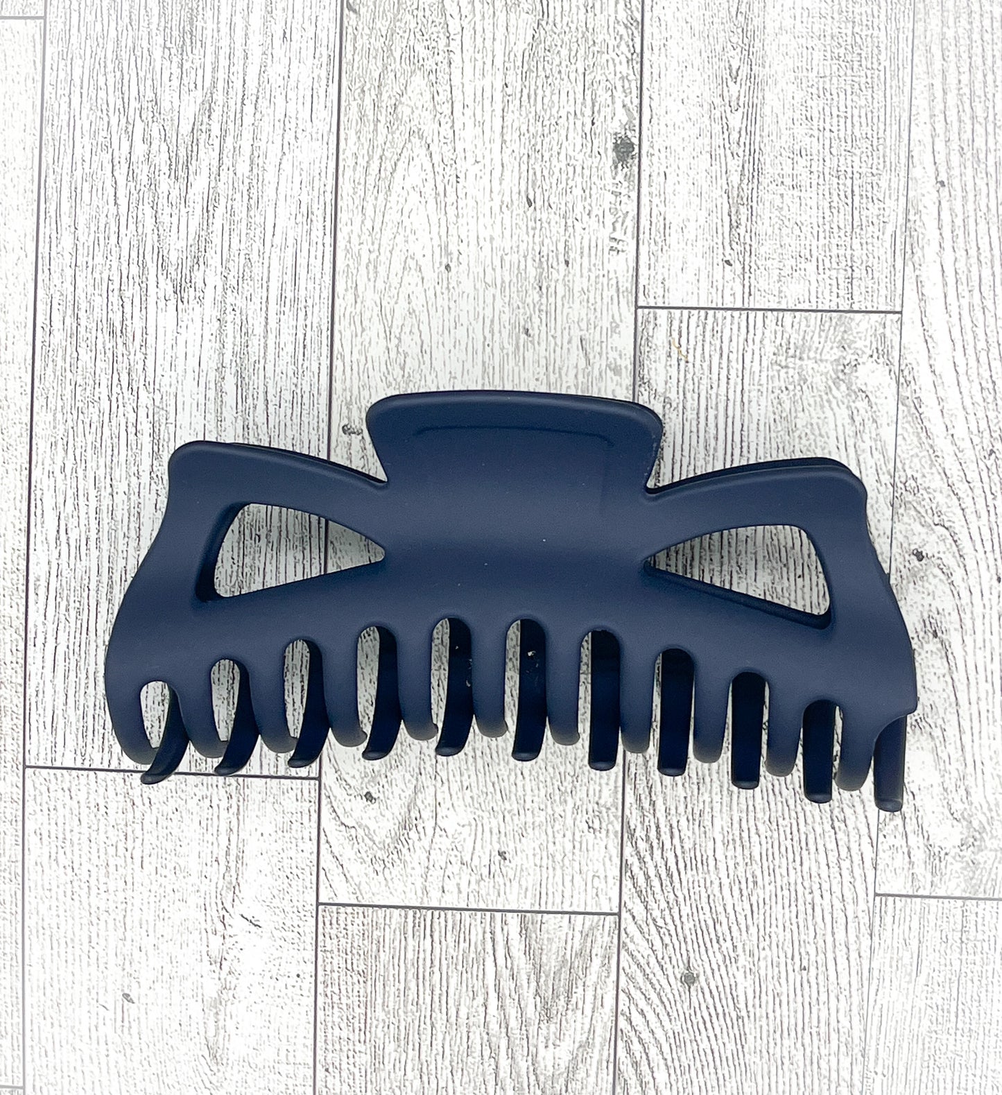 Matte Navy Blue Hair Claw - Classic Bow shape - 5 inches in length. Great for Braids, twists, long hair, thick hair, and coarse hair.