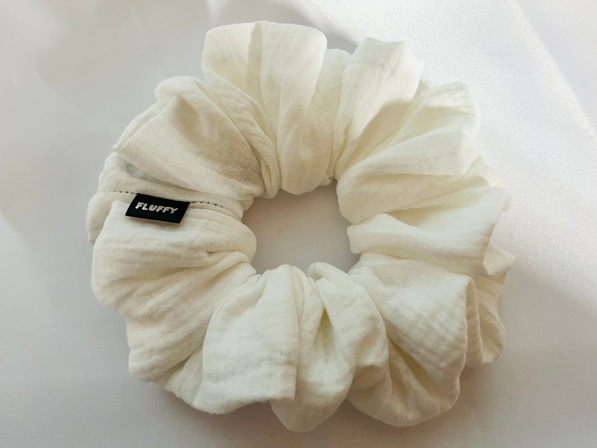 You are seeing our cotton scrunchies in 3 sizes.  The sizes of our cotton scrunchies  are Large, Medium and Mini.  Simply select the size you want in the drop down menu and add them to the card.   Our cotton scrunchies are perfect for all hair types and every person. We have multiple colors and sizes available