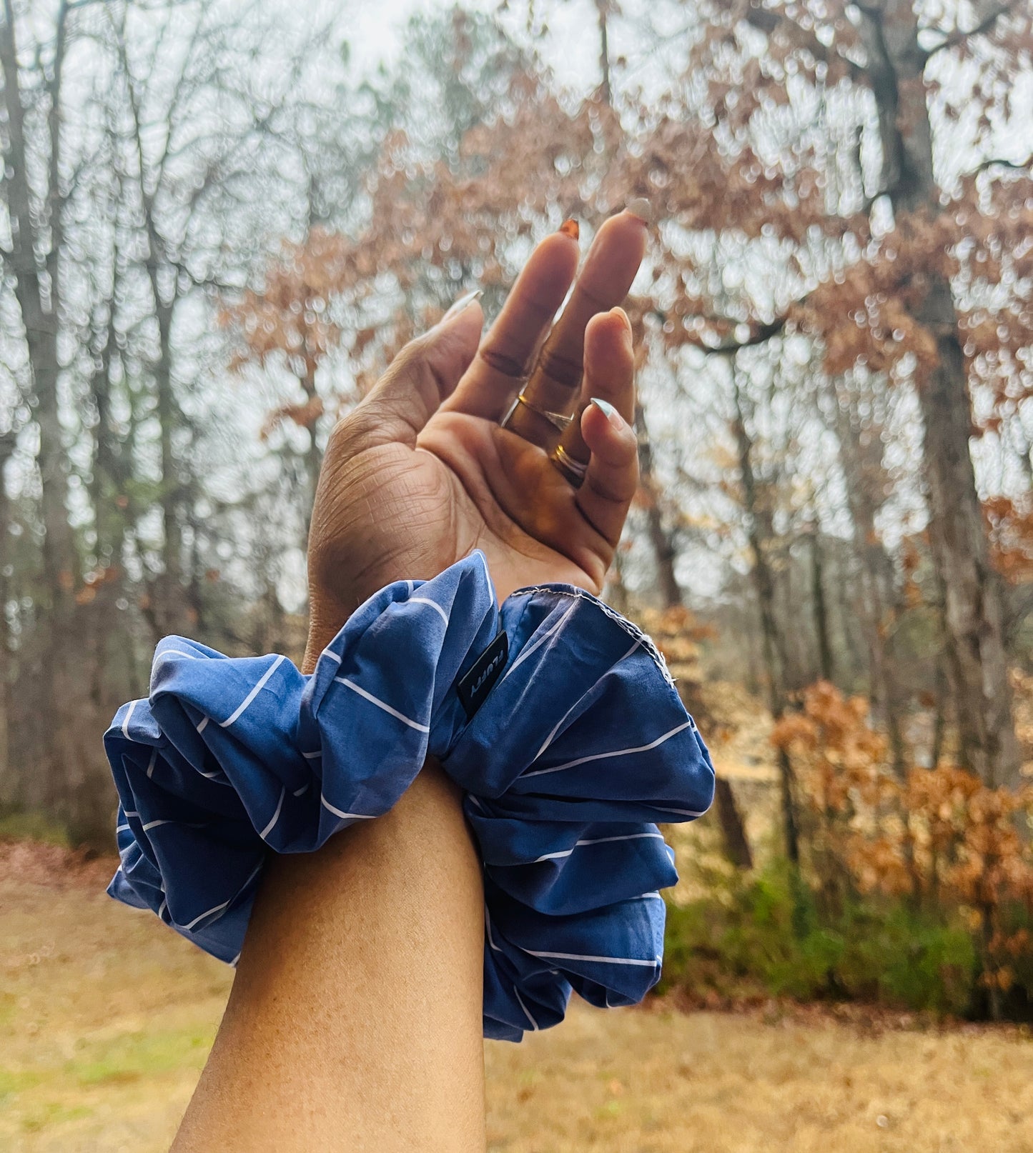 The Ultimate Sleek Pinstripe Fluffy Scrunchie .  The sizes of our cotton scrunchies  are Large, Medium and Mini.  Simply select the size you want in the drop down menu and add them to the card.   Our cotton scrunchies are perfect for all hair types and every person. We have multiple colors and sizes available